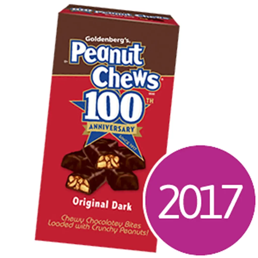 Goldenberg's Peanut Chews 100th anniversary box with chocolate candy pieces and a 2017 date label.