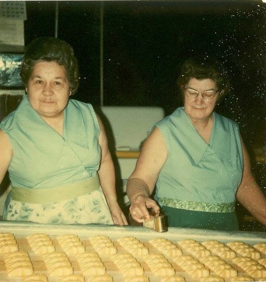 Vintage photo where two womens working in a factory.